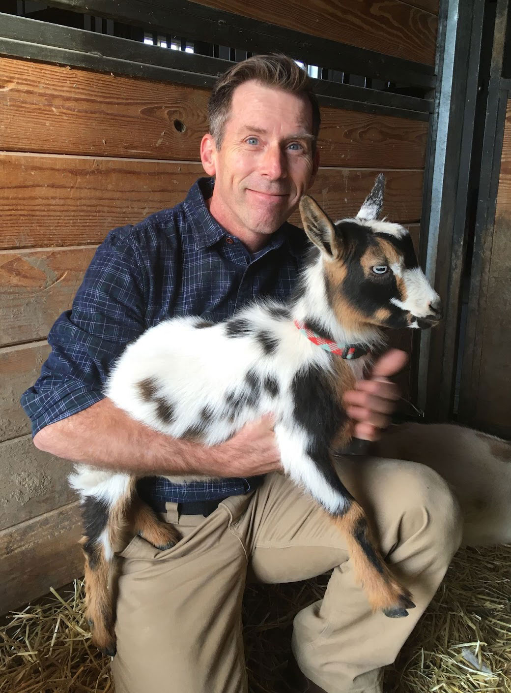 Dr. Vickers Holding Goat Dr. Vickers Holding Goat